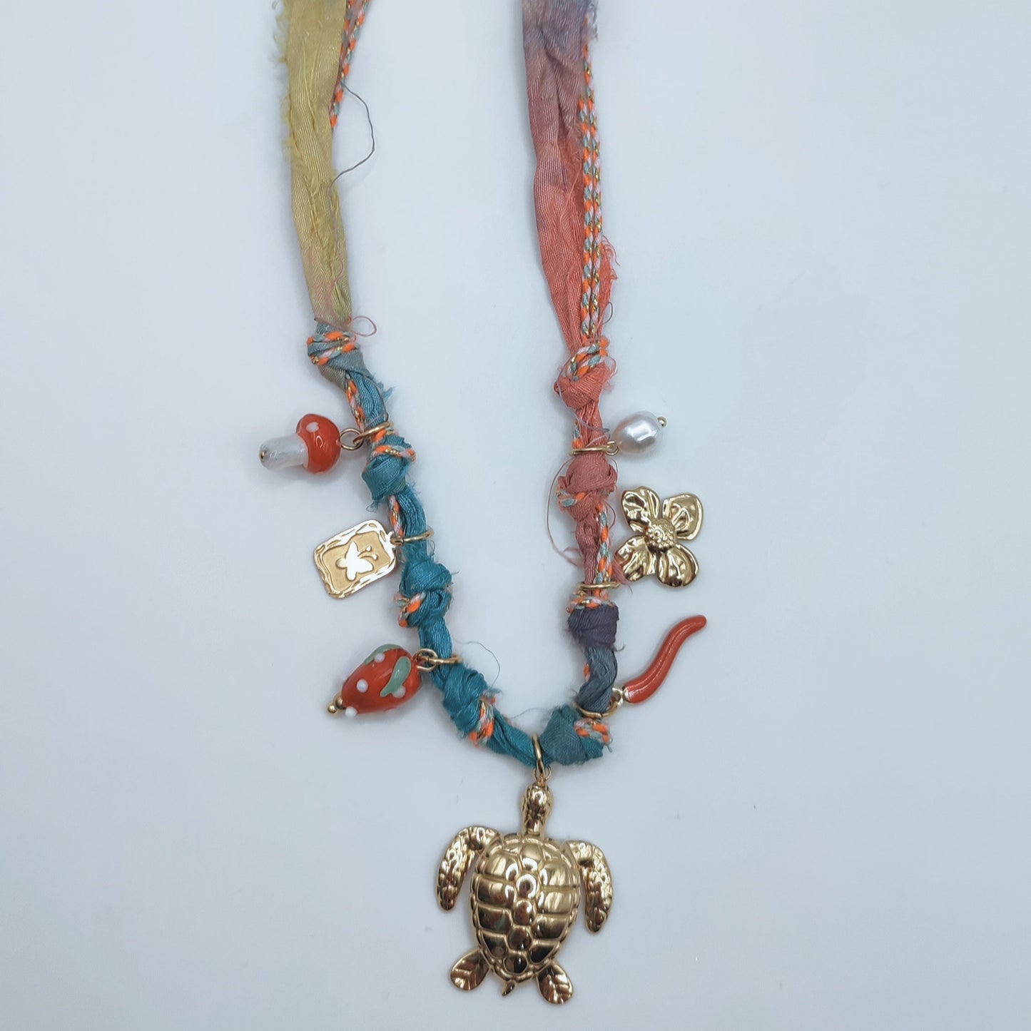 COLLAR MULTICHARM TELA